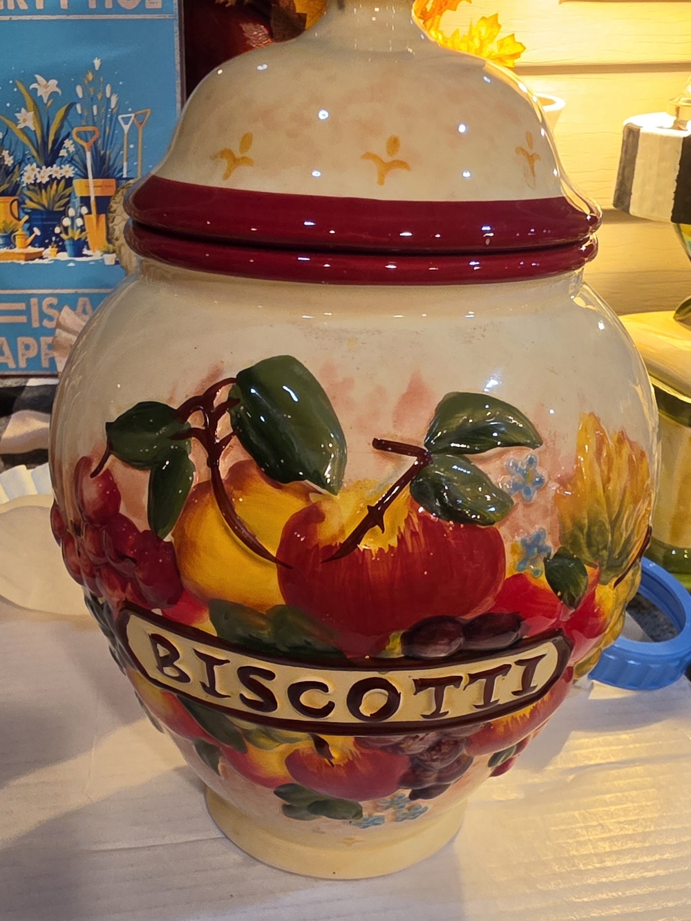 Biscotti Ceramic Canister with Red Accent and Fruit Motif